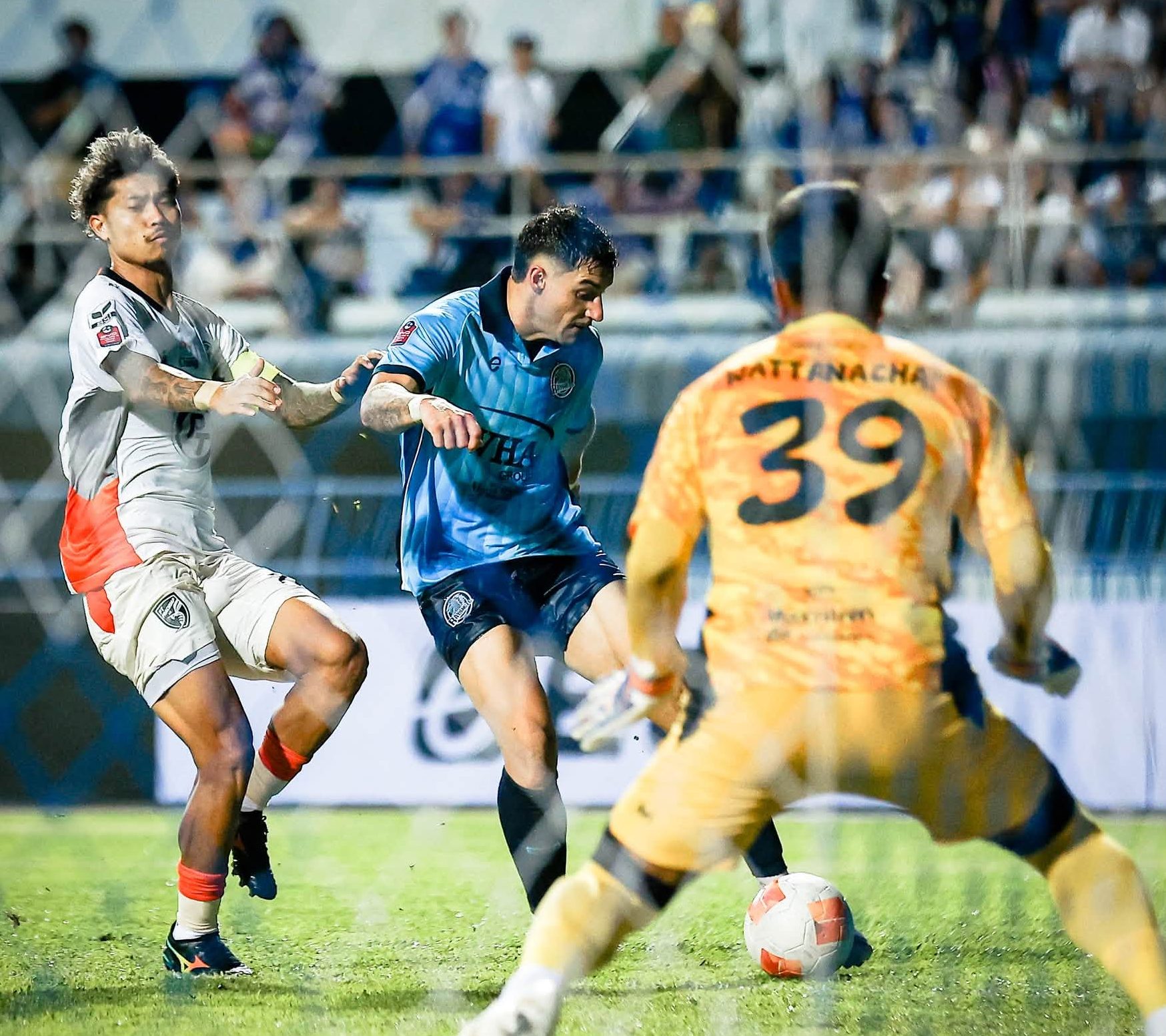 Rayong players in action against PT Prachuap