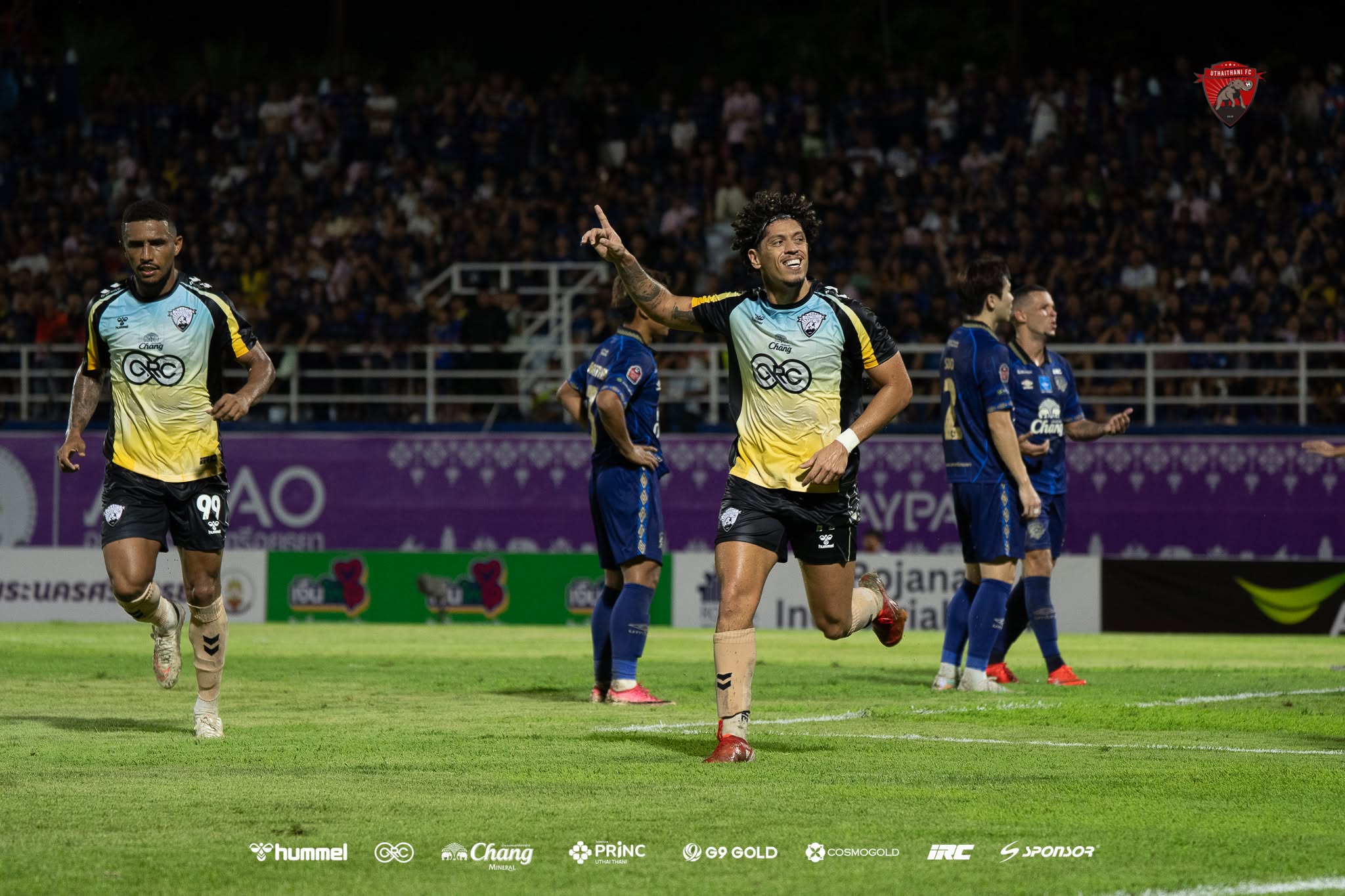 Uthai Thani players celebrate their stoppage-time winner at Ayutthaya