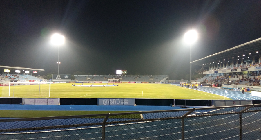 The pitch and main stand at Chonburi Daikin Stadium under floodlights at night
