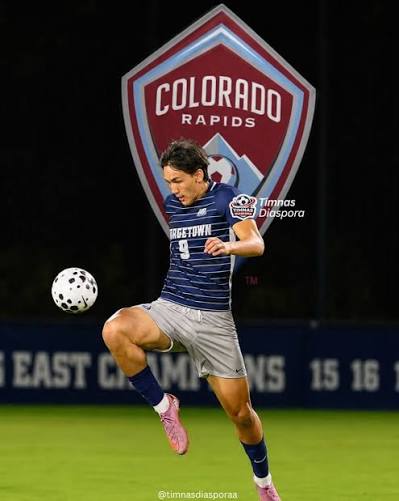Graphic of Mitchell Baker in Georgetown kit in front of the Colorado Rapids crest