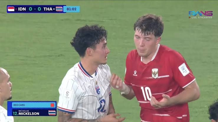 Nicholas Mickelson speaks to Ole Romeny after being shown a red card in the final