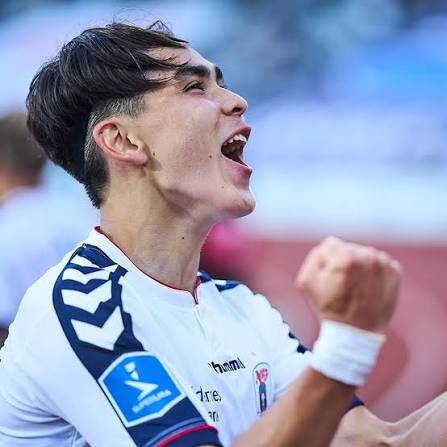 Eric Kahl celebrating in AGF's white shirt